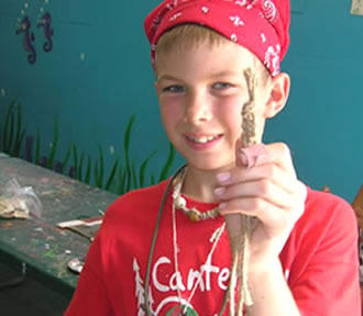 Boy holding friendship bracelet